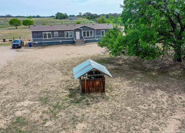 Property at 322 County Road 7755, Devine, TX 78016, 4 beds, 2 baths
