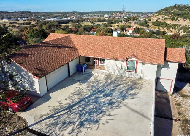 Property at 1208 Cypress Creek Rd, Kerrville, TX 78028-2241, 4 beds, 3 baths