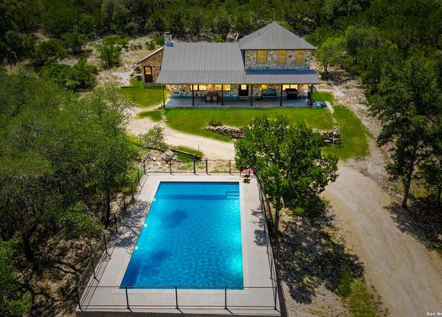 Property at 1539 River Rd, Concan, TX 78838, 5 beds, 4.5 baths