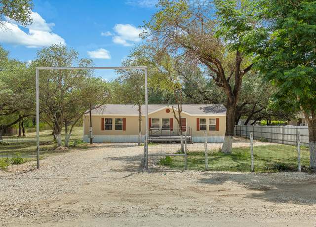 Property at 823 County Road 6850, Lytle, TX 78052, 4 beds, 2 baths