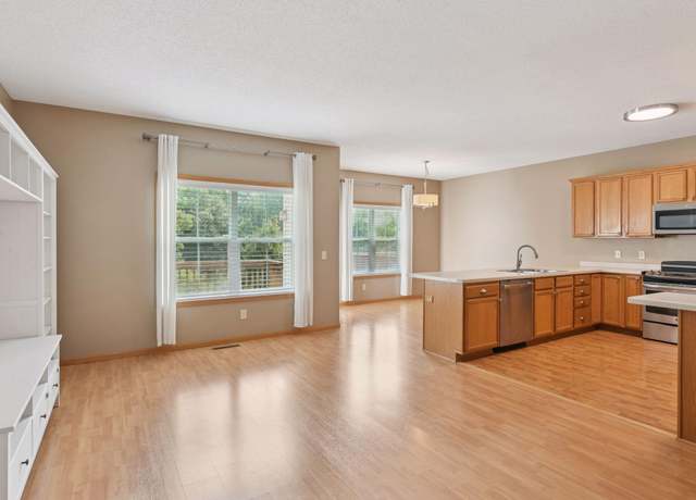 Property at 7525 5th St N, Oakdale, MN 55128, 3 beds, 3 baths