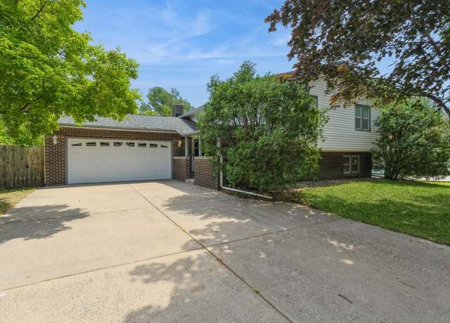 Property at 8240 Sumter Ave N, Brooklyn Park, MN 55445, 4 beds, 3 baths