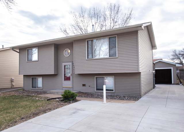 Property at 10470 Palm St NW, Coon Rapids, MN 55433, 4 beds, 2 baths