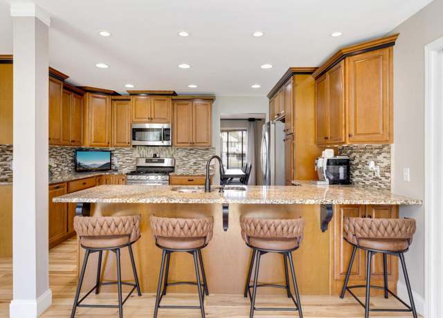 Property at 18127 Quincy Ct NW, Elk River, MN 55330, 4 beds, 3 baths