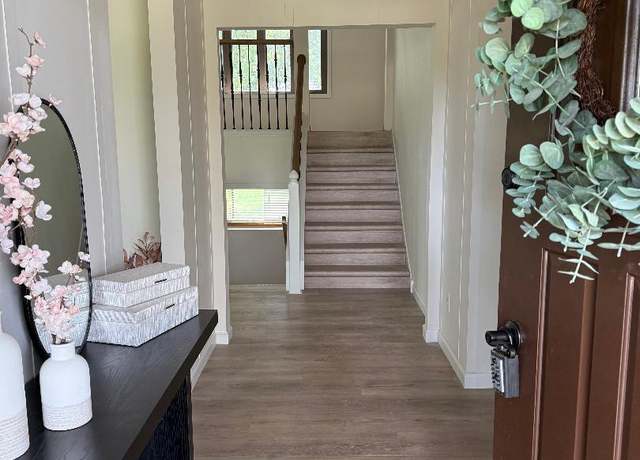 Property at 12211 Olive St NW, Coon Rapids, MN 55448, 4 beds, 3 baths