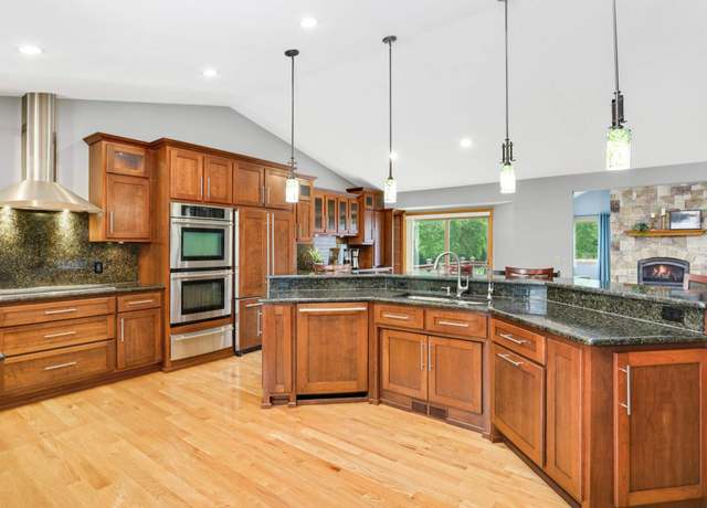 Property at 9412 Lakeside Trl, Champlin, MN 55316, 5 beds, 3 baths