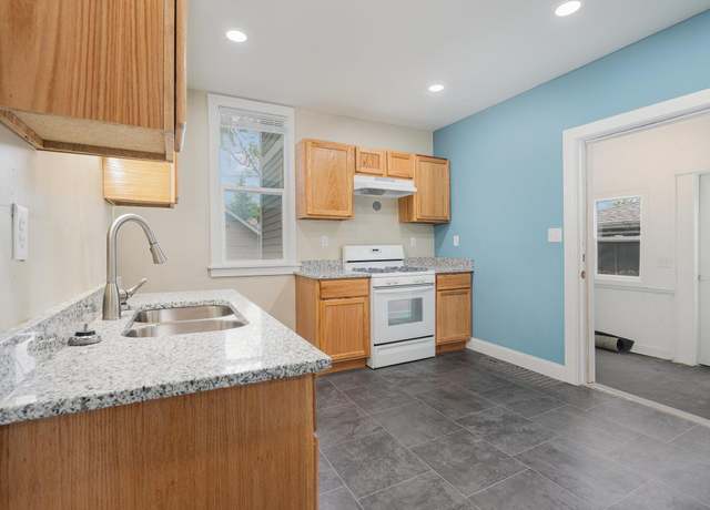 Property at 1053 Lawson Ave E, Saint Paul, MN 55106, 5 beds, 2 baths