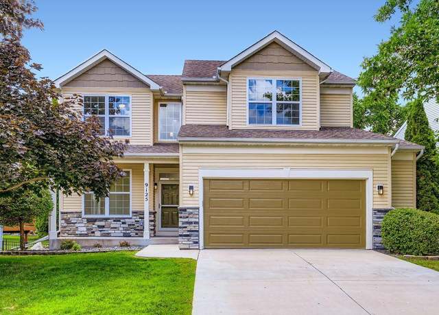 Property at 9125 Olive Ln N, Maple Grove, MN 55311, 5 beds, 4 baths