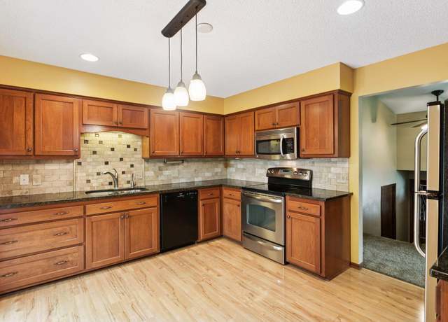 Property at 7701 N College Park Dr, Brooklyn Park, MN 55445, 4 beds, 2 baths