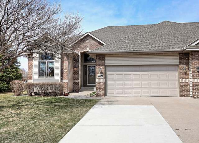 Property at 5201 107th Ave N, Brooklyn Park, MN 55443, 4 beds, 3 baths