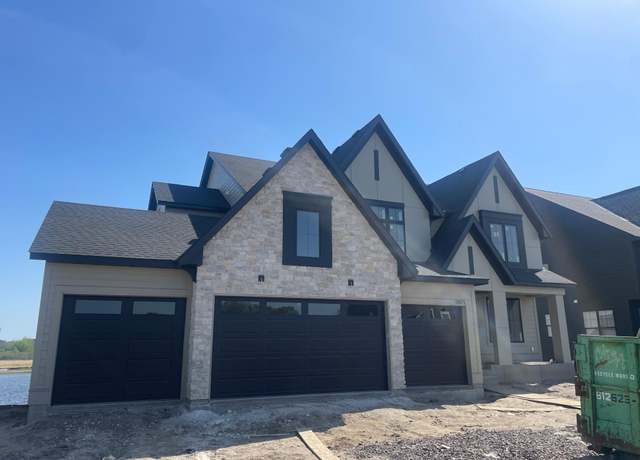 Property at 5871 Freeland Alcove N, Hugo, MN 55038, 4 beds, 5 baths