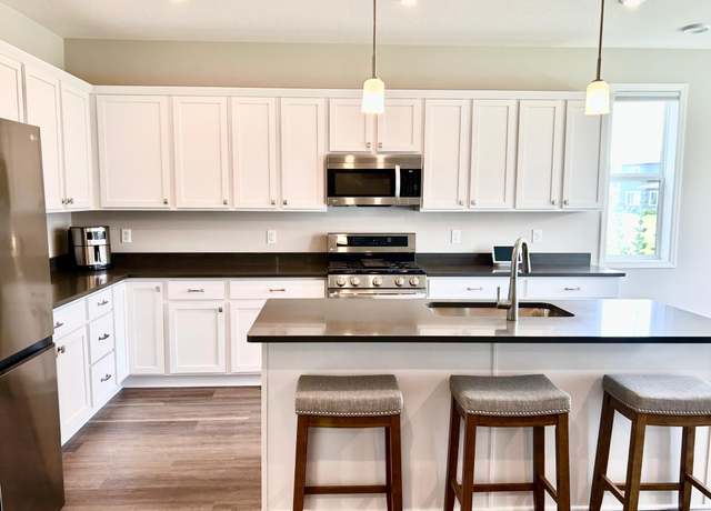 Property at 9931 Bluebird St NW, Coon Rapids, MN 55433, 3 beds, 3 baths