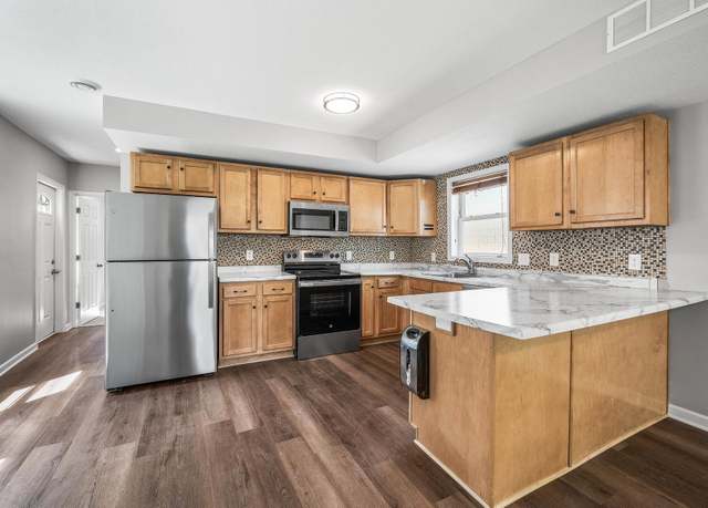 Property at 1415 Galtier St, Saint Paul, MN 55117, 4 beds, 2 baths