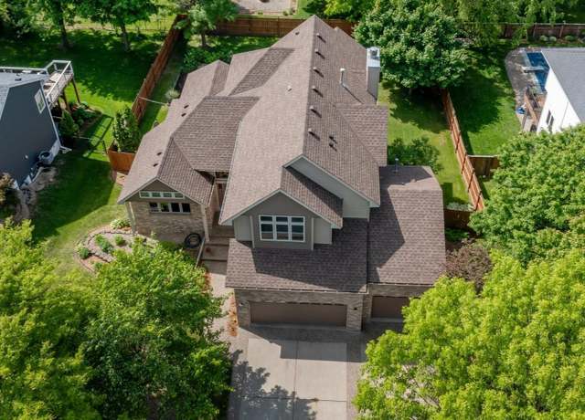 Property at 10647 Glen Eagle Rd, Woodbury, MN 55129, 5 beds, 4 baths