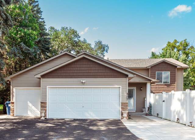 Property at 307 Hayden Lake Rd W, Champlin, MN 55316, 4 beds, 2 baths