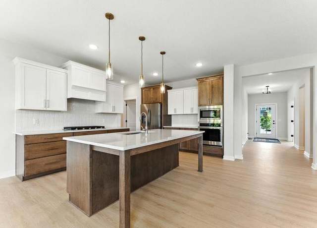 Property at 12800 Stutz Ct NE, Blaine, MN 55449, 5 beds, 4 baths
