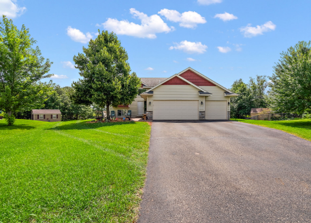 Property at 1048 152nd Ln NW, Andover, MN 55304, 4 beds, 3 baths