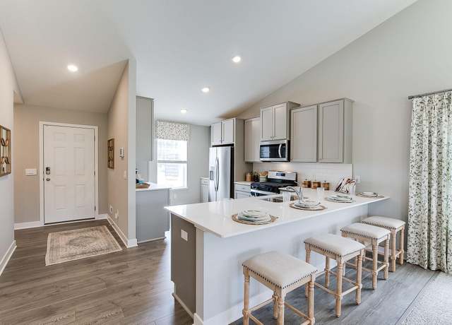 Property at 9879 89th St S, Cottage Grove, MN 55016, 4 beds, 4 baths