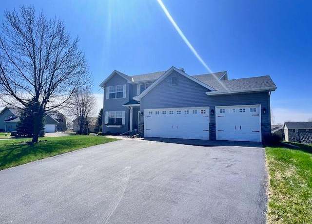 Property at 645 Elm St NE, Lonsdale, MN 55046, 4 beds, 3 baths