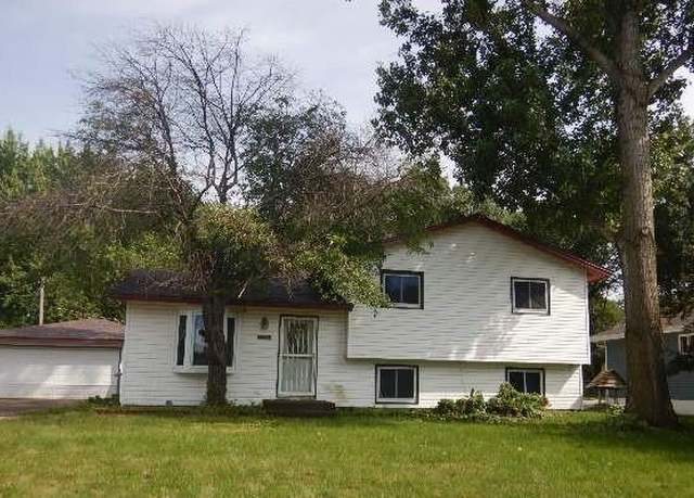 Property at 12024 Oak Park Blvd NE, Blaine, MN 55434, 4 beds, 2 baths