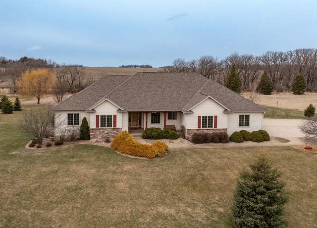 Property at 1109 36th St NW, Lansing Twp, MN 55912, 5 beds, 4 baths