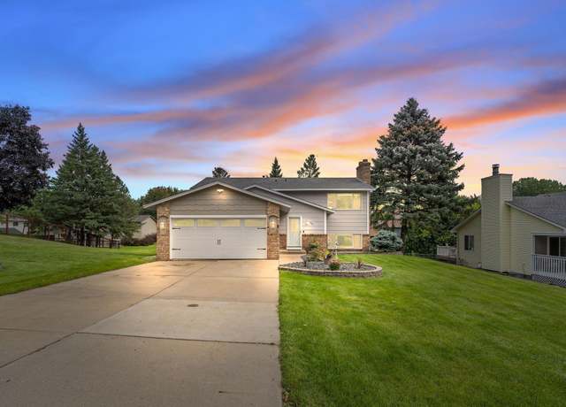Property at 7504 Upper 24th St N, Oakdale, MN 55128, 4 beds, 2 baths