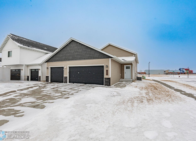 Property at 2311 Eagle Valley Dr S, Fargo, ND 58104, 4 beds, 2 baths