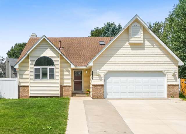 Property at 1438 Corral Ln, Woodbury, MN 55125, 4 beds, 2 baths