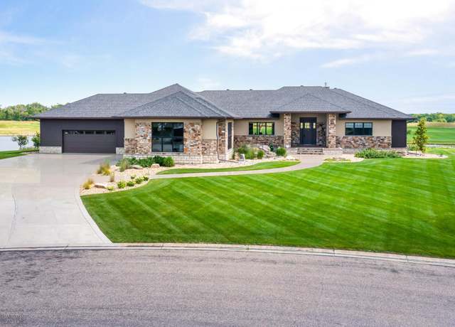 Property at 446 Trent Jones Dr, Oxbow, ND 58047, 6 beds, 5 baths