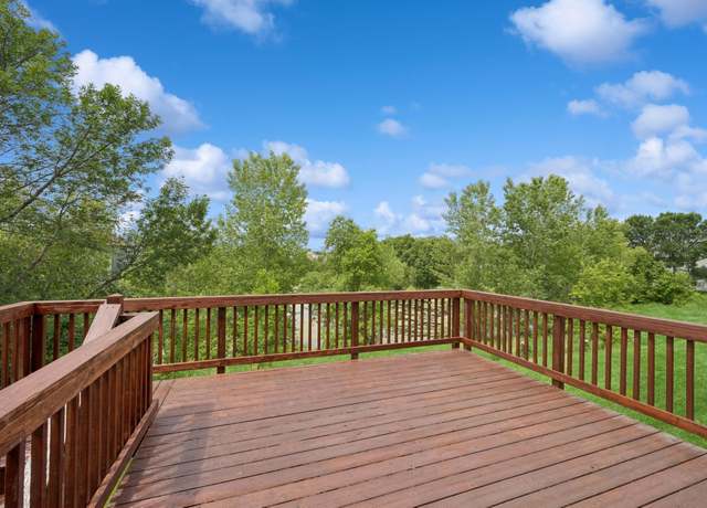 Property at 880 Drew Dr, Woodbury, MN 55129, 4 beds, 3 baths