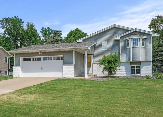 Property at 10751 Kumquat St NW, Coon Rapids, MN 55448, 4 beds, 2 baths
