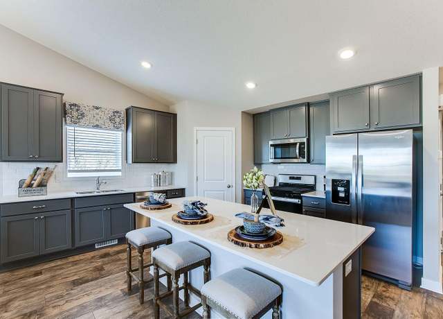 Property at 8236 Saddle Trl, Woodbury, MN 55129, 4 beds, 4 baths