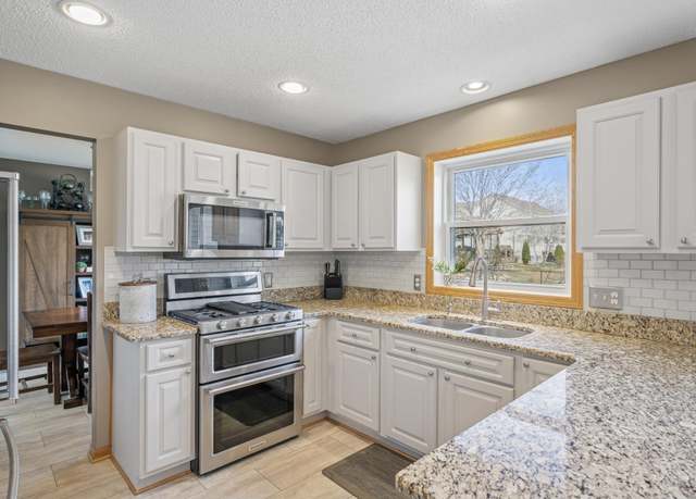 Property at 104 Birch Ave NW, Saint Michael, MN 55376, 4 beds, 3 baths