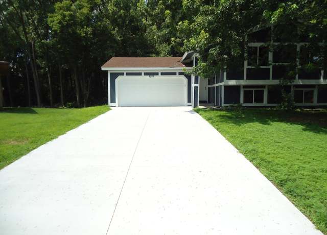 Property at 8205 Queen Ave N, Brooklyn Park, MN 55444, 5 beds, 2 baths