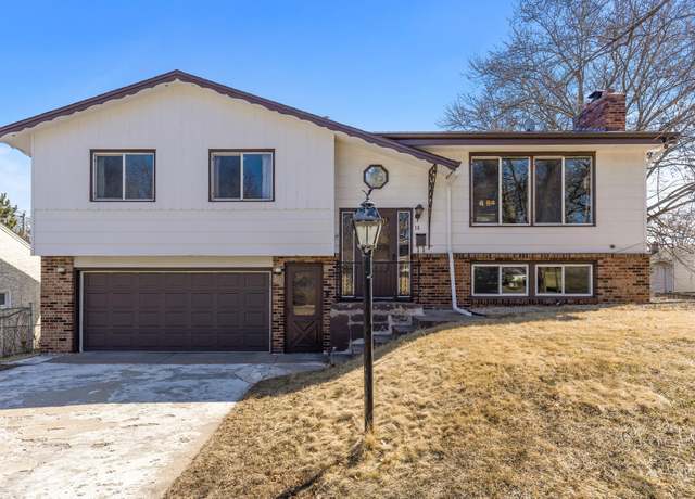 Property at 18 Michael St, Saint Paul, MN 55119, 4 beds, 2 baths