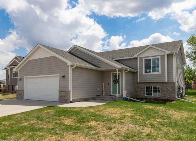Property at 802 10th St NE, Kasson, MN 55944, 4 beds, 3 baths