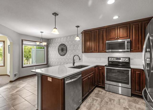 Property at 7582 Ojibway Park Bay, Woodbury, MN 55125, 2 beds, 2 baths