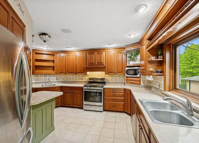 Property at 14129 Quay St NW, Andover, MN 55304, 4 beds, 3 baths