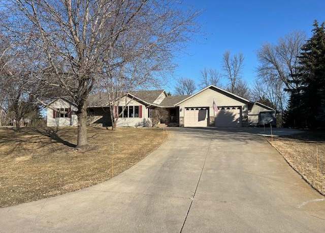 Property at 1102 W Pleasure Dr, Litchfield, MN 55355, 4 beds, 4 baths