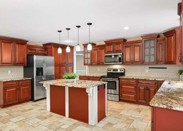 Property at 11735 52nd Ave N, Plymouth, MN 55442, 4 beds, 4 baths