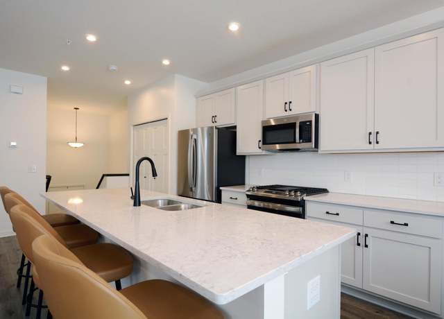 Property at 8698 London Cir NE Unit E, Blaine, MN 55449, 3 beds, 3 baths