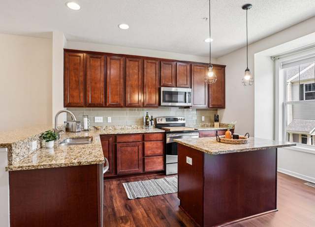 Property at 8257 Norwood Ln N, Maple Grove, MN 55369, 4 beds, 4 baths