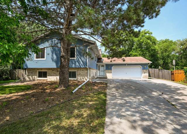 Property at 6215 Cavell Ave N, Brooklyn Park, MN 55428, 4 beds, 2 baths