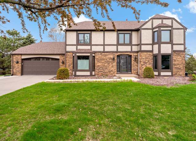 Property at 7144 Sherwood Rd, Woodbury, MN 55125, 5 beds, 4 baths