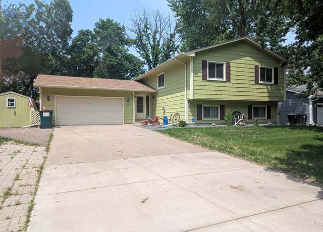 Property at 10440 Hummingbird St NW, Coon Rapids, MN 55433, 4 beds, 2 baths