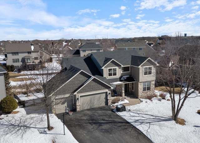 Property at 10512 Toledo Dr N, Brooklyn Park, MN 55443, 5 beds, 4 baths