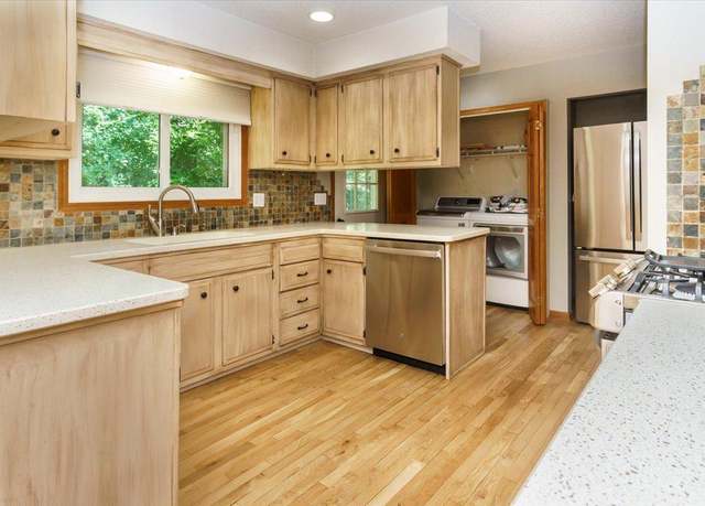 Property at 8335 W Bush Lake Rd, Bloomington, MN 55438, 4 beds, 3 baths