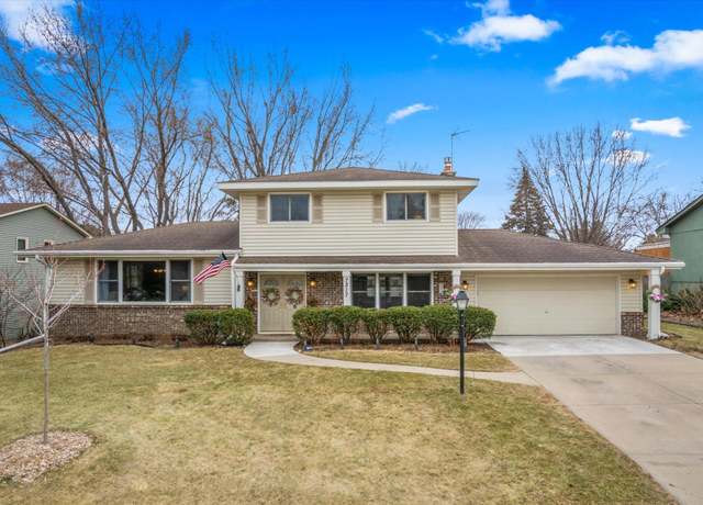 Property at 7217 Braemar Ln, Woodbury, MN 55125, 4 beds, 3 baths
