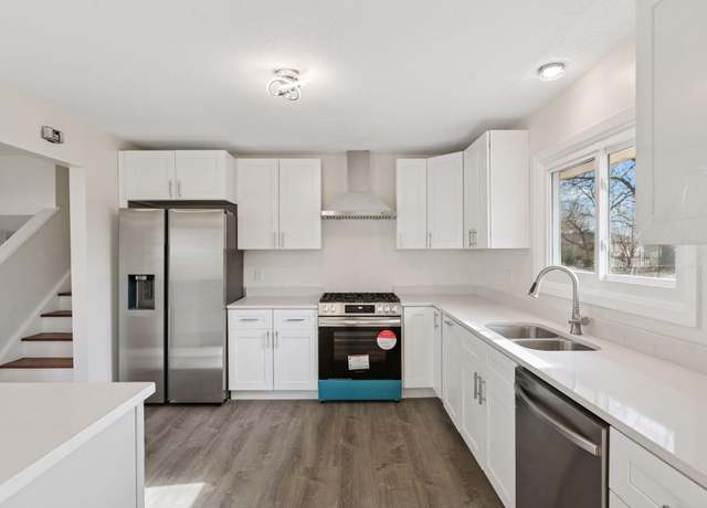 Property at 7516 Scott Ave N, Brooklyn Park, MN 55443, 4 beds, 4 baths