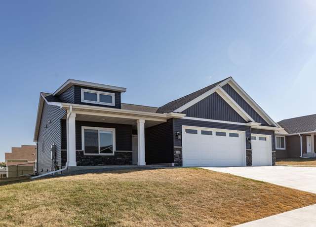 Property at 1102 6th Ave NW, Kasson, MN 55944, 4 beds, 3 baths